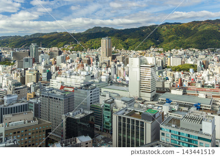 Streetscape of Kobe's Chuo Ward with Mount Rokko in the background. Streetscape of Kobe's Chuo Ward with Mount Rokko in the background. 143441519