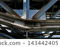 Riveted steel girder joint of industrial railway bridge. 143442405