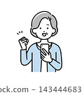 An illustration of a senior woman making a triumphant gesture while holding her smartphone. 143444683