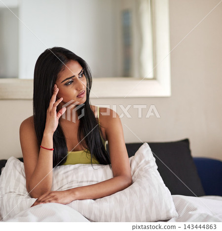 Headache, woman and thinking in morning with memory, depression and frustrated in bed. Tired, Indian girl and migraine at home for pain, unwell and stress from fatigue, sick and tension with worry 143444863