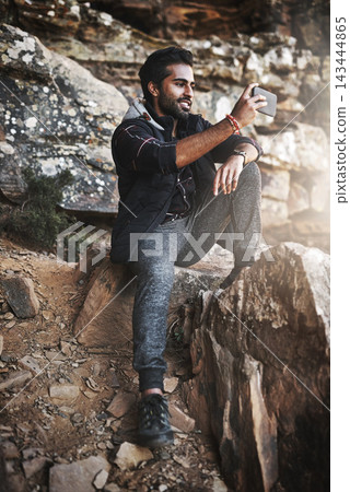 Mountain, man and picture of view for hiker, cellphone and fitness and training for weekend hobby. Social media, smile and content for online vlog, technology and workout in nature for male person Mountain, man and picture of view for hiker, cellphone and fitness and training for weekend hobby. Social media, smile and content for online vlog, technology and workout in nature for male person 143444865