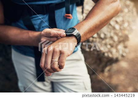 Arms, man and hiking watch in outdoors for fitness with health in mountain nature for exploration. Time, cardio and active hiker with climbing for expedition with travel, stone and trekking in Spain. Arms, man and hiking watch in outdoors for fitness with health in mountain nature for exploration. Time, cardio and active hiker with climbing for expedition with travel, stone and trekking in Spain. 143445219