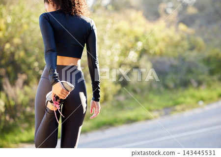 Runner, outdoor and woman stretching leg for running challenge, marathon training or cardio in morning. Back, warm up and athlete getting ready for workout, exercise or sports activity in nature Runner, outdoor and woman stretching leg for running challenge, marathon training or cardio in morning. Back, warm up and athlete getting ready for workout, exercise or sports activity in nature 143445531