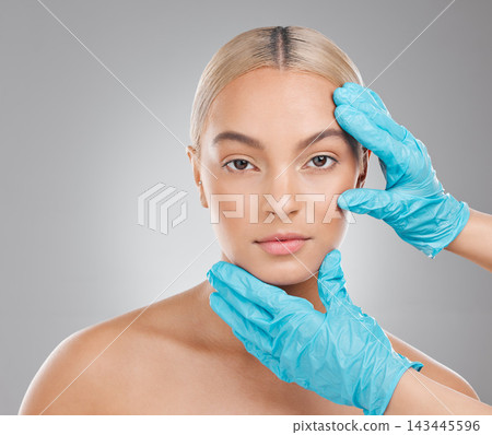 Studio, hands and woman for skincare and face, gloves and plastic surgery on gray background. Beauty, cosmetic or medical treatment for selfcare, filler or collagen for portrait person for anti aging Studio, hands and woman for skincare and face, gloves and plastic surgery on gray background. Beauty, cosmetic or medical treatment for selfcare, filler or collagen for portrait person for anti aging 143445596