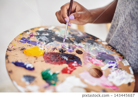 Person, hands and art with palette in closeup for painting project, creative expression and hobby at home. Painter, artwork and color mixing with brush and sustainable materials for inspiration Person, hands and art with palette in closeup for painting project, creative expression and hobby at home. Painter, artwork and color mixing with brush and sustainable materials for inspiration 143445687