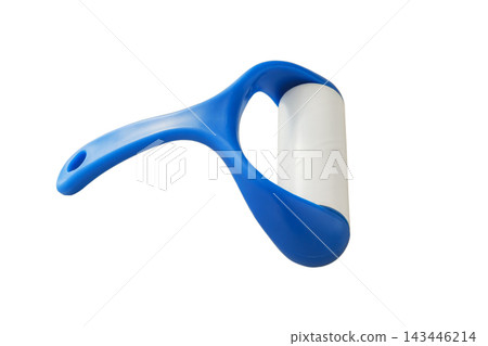 Lint roller for removing pet hair from clothes, with a blue plastic handle. Isolated on a white background. Reusable lint roller. Cleaning tool. Top view. Lint roller for removing pet hair from clothes, with a blue plastic handle. Isolated on a white background. Reusable lint roller. Cleaning tool. Top view. 143446214