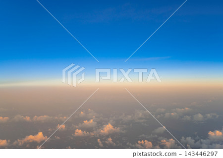 Sunset view from inside an airplane Sunset view from inside an airplane 143446297
