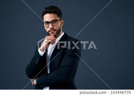 Business, investor and portrait of man in studio, dark background and thinking of stock market. Corporate, professional and Arab businessman trading in crypto or planning for investment in economy Business, investor and portrait of man in studio, dark background and thinking of stock market. Corporate, professional and Arab businessman trading in crypto or planning for investment in economy 143446770