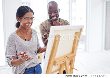 Woman, happy and instructor in studio as art creative for painting, inspiration and talent workshop by easel. Artist, laugh and advice with mentor by canvas for drawing, learning or idea in atelier 143447052