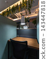 Modern Quiet Study Cafe Interior with Private Desks and Partitions 143447818
