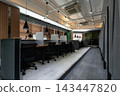 Modern Quiet Study Cafe Interior with Private Desks and Partitions 143447820