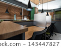 Modern Quiet Study Cafe Interior with Private Desks and Partitions 143447827