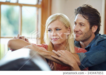 Happy, couple and hug on sofa for support, time and bonding together at home for marriage and trust. Smile, man and woman with love embrace on couch with vision for relationship, growth and relax Happy, couple and hug on sofa for support, time and bonding together at home for marriage and trust. Smile, man and woman with love embrace on couch with vision for relationship, growth and relax 143447851