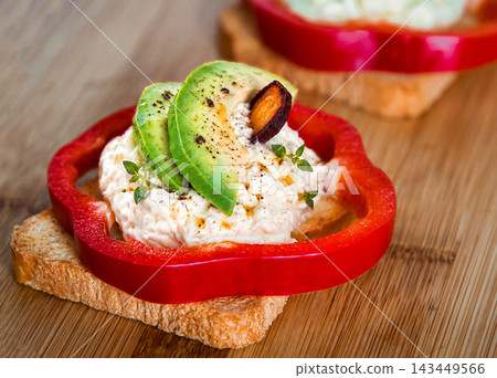 Avocado and cottage cheese toast with red bell pepper Avocado and cottage cheese toast with red bell pepper 143449566