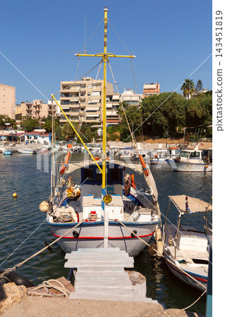 Traditional Fishing Boat in Chania Harbor, Crete, Greece Traditional Fishing Boat in Chania Harbor, Crete, Greece 143451819