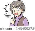 An elderly woman turns around in surprise. 143455278