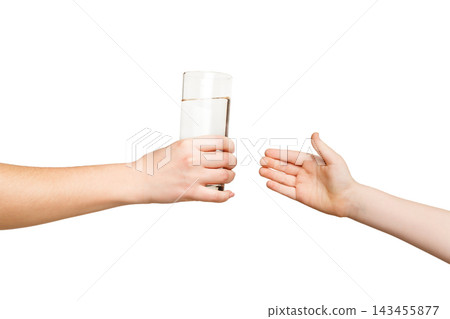 Woman hand giving glass of water to kid, isolated on white background Woman hand giving glass of water to kid, isolated on white background 143455877
