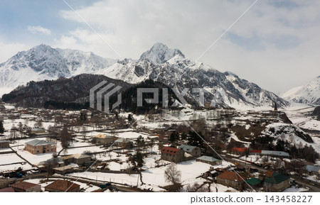 Winter landscape with Sioni townlet in Caucasus mountains, Georgia Winter landscape with Sioni townlet in Caucasus mountains, Georgia 143458227