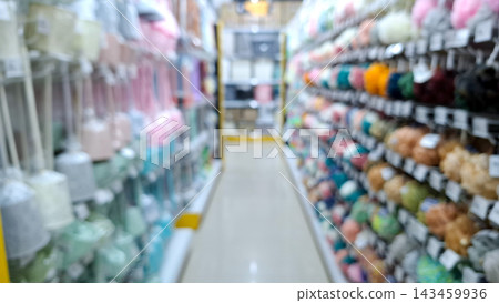 Blurred Shopping Mall Aisle With Colorful Bath Sponges Blurred Shopping Mall Aisle With Colorful Bath Sponges 143459936