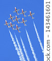 The Canadian Air Force Snowbirds jets team performing acrobatic figures on a blue sky 143461601