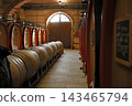 A huge wooden barrel from a winery in Barolo, Piedmont, Italy. 143465794
