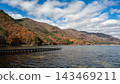 Autumn mountains and lake adorned with colorful foliage: Lake Kizaki, Nagano Prefecture 143469211