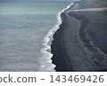 Aerial view of waves crashing on Reynisfjara black sand beach Iceland 143469426