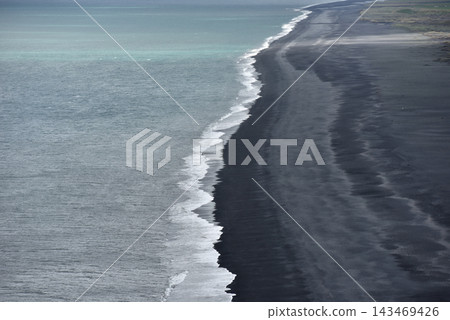 Aerial view of waves crashing on Reynisfjara black sand beach Iceland Aerial view of waves crashing on Reynisfjara black sand beach Iceland 143469426