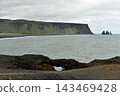 View of Reynisdrangar sea stacks and Reynisfjara beach from Dyrholaey Iceland 143469428