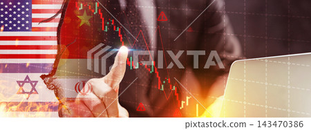 Geopolitical tension with US, China, Israel, and Iran flags over declining financial charts and a businessman hand touching a screen with warning symbols and a laptop. Finance and economic concept 143470386