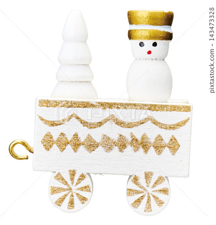 A white and gold wooden Christmas train car with snowman and tree figurines is placed against a white background. A white and gold wooden Christmas train car with snowman and tree figurines is placed against a white background. 143473328