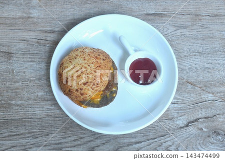 barbecue beef cheeseburger wholewheat bread dressing gravy sauce dipping ketchup on plate barbecue beef cheeseburger wholewheat bread dressing gravy sauce dipping ketchup on plate 143474499