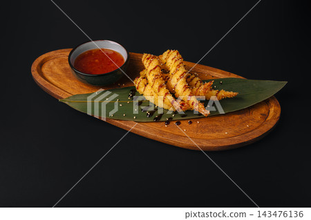 Crispy fried shrimp tempura with sweet chili sauce 143476136