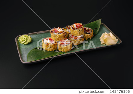 Crispy fried tempura sushi rolls with ginger and wasabi Crispy fried tempura sushi rolls with ginger and wasabi 143476306