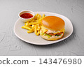Chicken burger meal with french fries and chili sauce 143476980