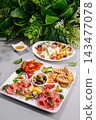 Charcuterie platter with antipasto and cheese selection 143477078