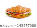 Croissant sandwich with ham, lettuce, cucumber, tomato 143477080