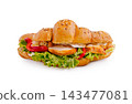 Croissant sandwich with grilled chicken, lettuce, red pepper 143477081