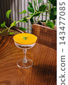 Mango parfait dessert with granola and mint leaf 143477085