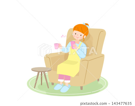 A woman relaxing while looking at her smartphone. 143477635