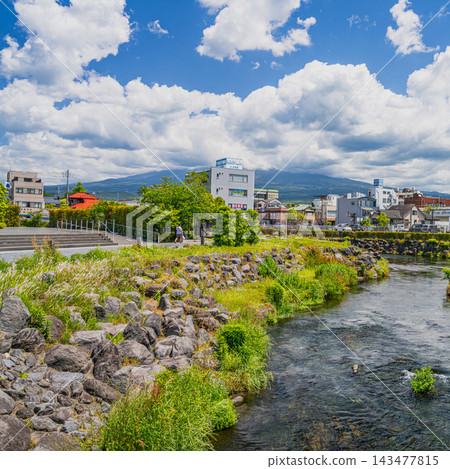 View of the Fujinomiya cityscape and the clear stream from Kanda River Fureai Plaza. View of the Fujinomiya cityscape and the clear stream from Kanda River Fureai Plaza. 143477815