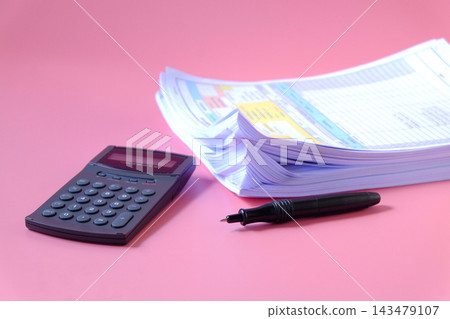 Stack of documents with calculator and pen on background. Stack of documents with calculator and pen on background. 143479107