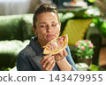 Woman Savoring Cheesy Pizza Cheese Stretch 143479955