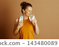 Serene Moment of Hydration for Active Woman 143480089