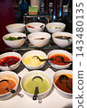 Colorful Sauce and Condiment Buffet Display 143480135