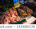 Fresh Seafood and Fish at a Vibrant Market Stall 143480136