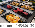 Fresh Raw Seafood Selection Displayed on Chilled Ice 143480139