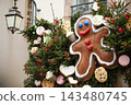 Christmas in Strasbourg, Alsace, France. Giant gingerbread man and festive holiday decorations on a historic street. 143480745