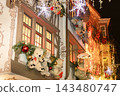 Strasbourg, France - December 24th, 2025: Famous Teddy Bear House decorated with giant Christmas teddy bears, festive lights and New Year ornaments at Le Tire-Bouchon restaurant in Alsace 143480747