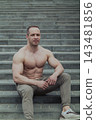 A CrossFit man poses for the camera on a sports 143481856